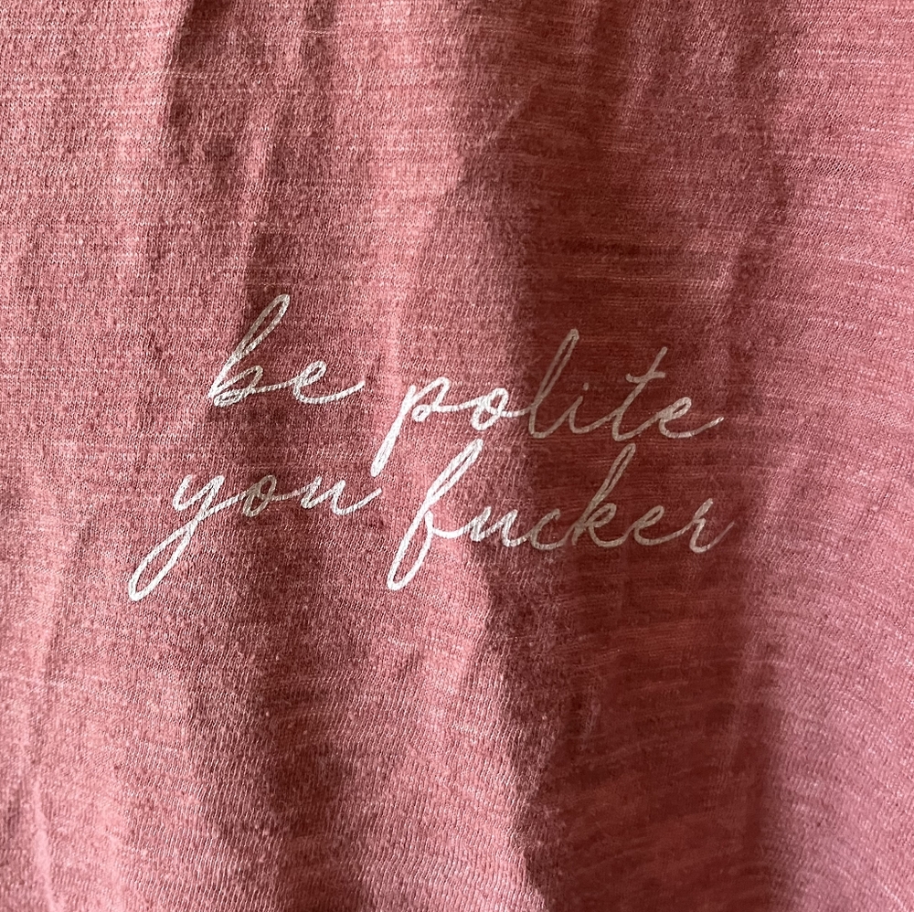 Red/maroon-ish graphic tee. Super soft. “Be Polite You F*cker” - Women's Large